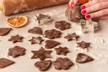 Christmas baking. Ginger dough for gingerbread on wooden table.