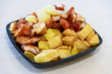 Chinese chicken with potatoes in sweet sauce