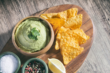 Arrangement Of Nachos (Corn Chips) And Guacamole (Avocado Sauce)