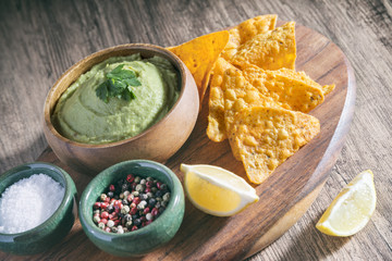 Arrangement Of Nachos (Corn Chips) And Guacamole (Avocado Sauce)