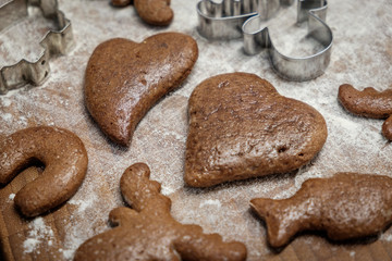Christmas homemade gingerbread cookies on wooden table