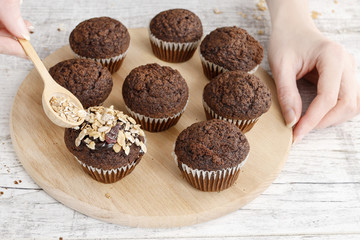 Chocolate muffins with oatmeal flakes.