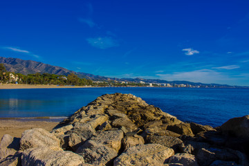 Fototapeta na wymiar Beach. The best views of the beach in Marbella. Malaga province, Costa del Sol, Andalusia, Spain. Picture taken – 14 december 2017.