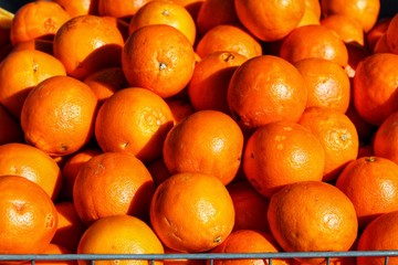 Oranges for sale at a market stall