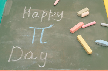 An image of the Pi number on the school board with chalk.