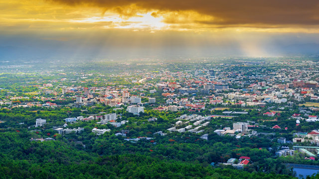 the Aerial Panorama View of Chiang Mai City with sunrise and clouds, Thailand