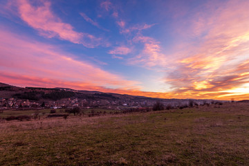 Sunrise over small village.