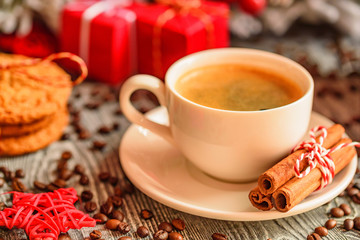 Cozy winter setting with cup of coffee