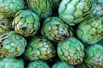 Artichokes for sale at a market stall
