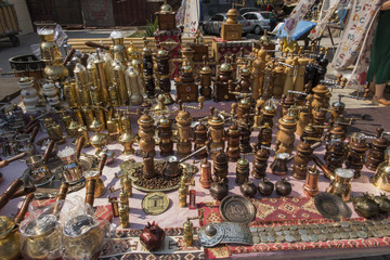Fototapeta na wymiar Yerevan, Armenia, September 17, 2017: Pepper grinders on the stand at the marketplace in Yerevan