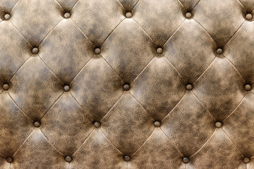 luxury buttoned brown leather background