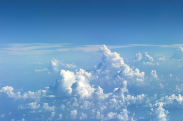 View at Clods on the Sky from the window of an aiplane. Skyscape viewed from airplane