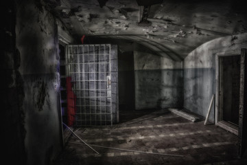 Fototapeta na wymiar Sinister and creepy interior of abandoned and rotten mental hospital
