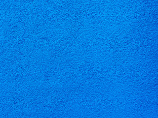 Obraz premium Blue wall texture background. Textured concrete plaster with spraying in the form of drops