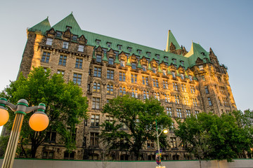 OTTAWA, ONTARIO / CANADA - JULY 27 2017: DOWNTOWN. PARLIAMENT BUILDINGS. REFLECTIONS.