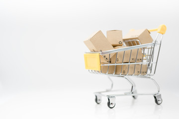 Miniature toy: Shopping cart and box isolated on white background , business , shopping concept.