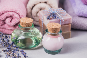 Obraz na płótnie Canvas Natural cosmetic oil, cream and natural handmade soap with lavender