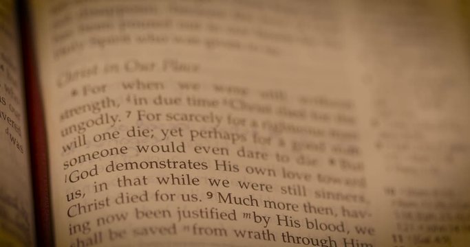 Macro shot of Romans 5_8 God demonstrates