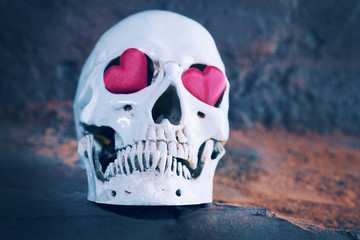 human skull with red heart . Concept for Valentine's Day.
