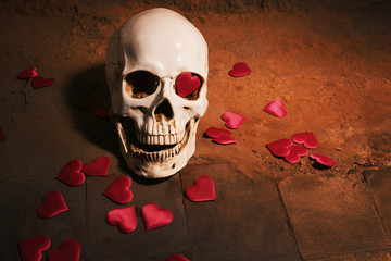 human skull with red heart . Concept for Valentine's Day.