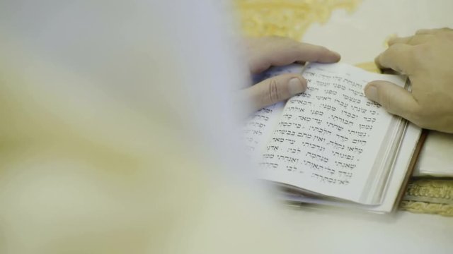 jewish prayer with tallit  on Tomb of King David on  Jerusalem