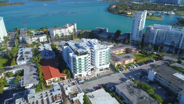 Aerial building under construction Miami Bay Harbor Islands 4k 24p