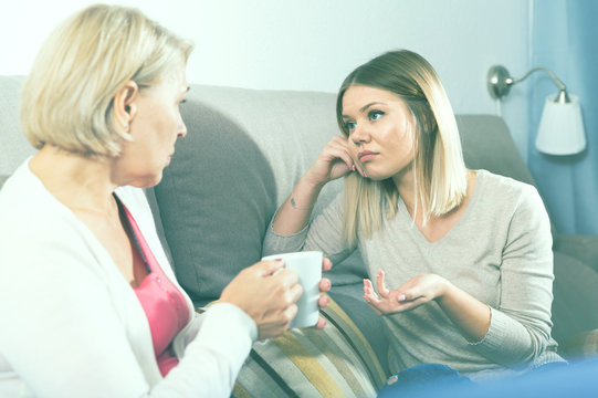 Mom And Adult Daughter Talking