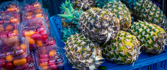 fresh pineapple 
at a market