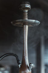 Stylish hookah made of glass and wood