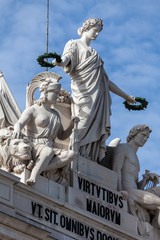 Statue of Glory rewarding Valor and Genius on the Rua Augusta Arch in Lisbon, Portugal, a symbol of...