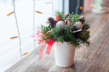 Christmas composition in a glass, floristics