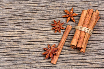 Group of cinnamon sticks with anise star on table