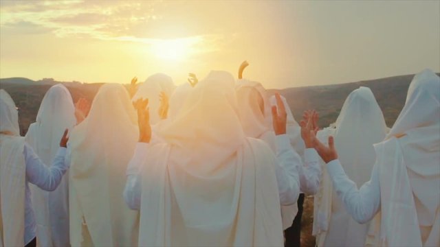 Jewish men prayer With Talit and shofar in sunset