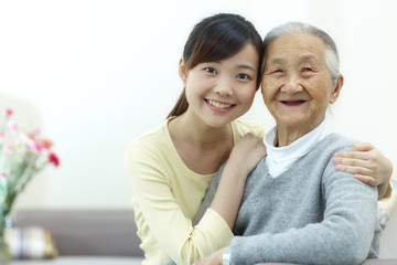 Obraz premium Happy senior woman with her granddaughter