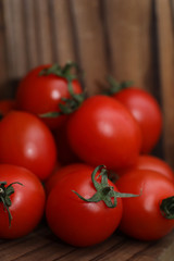Fresh bright and juicy tomatoes on the kitchen