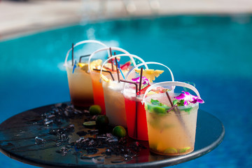 Selection of cocktail in ice bucket special drink for pool party