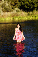 Attractive Japanese American Woman Standing In River