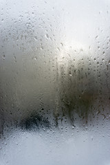 Fototapeta na wymiar abstract drops of rain on car window