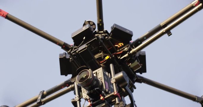 Large drone with camera flying - extreme close up