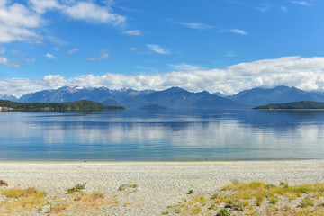 Manapouri lake beach