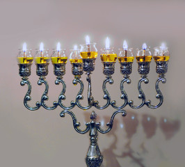 Chanukah lamp burning olive oil rather than candles