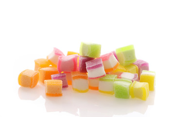 Colorful cube jelly candy isolated in white background