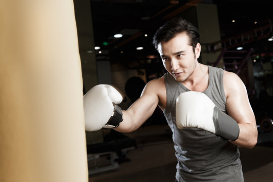Young men exercise in the gym