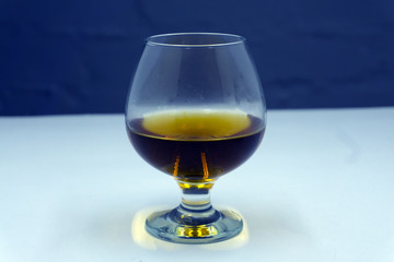 glass of brandy on a dark background.