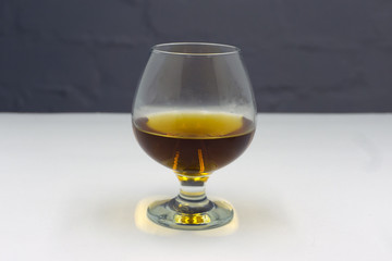 a glass of whiskey half full