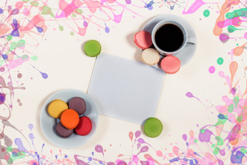 Coffee cup, macaroons and blank card with space for your text