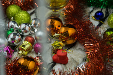 Naklejka na ściany i meble festive blurred background with sparkling lights and tinsel. Christmas and magical New year background template.
