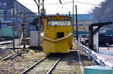 Fototapeta na wymiar 日本の鉄道の雪かき電車