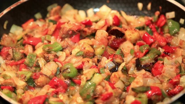 Food with different kind of vegetable cooking in a pan