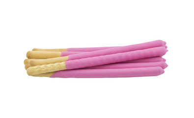 pile of biscuit sticks coated with strawberry chocolate isolated on white background